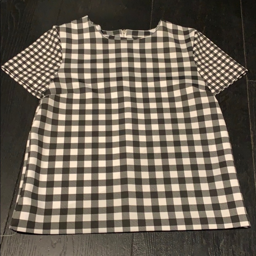 A gray black and white plaid shirt